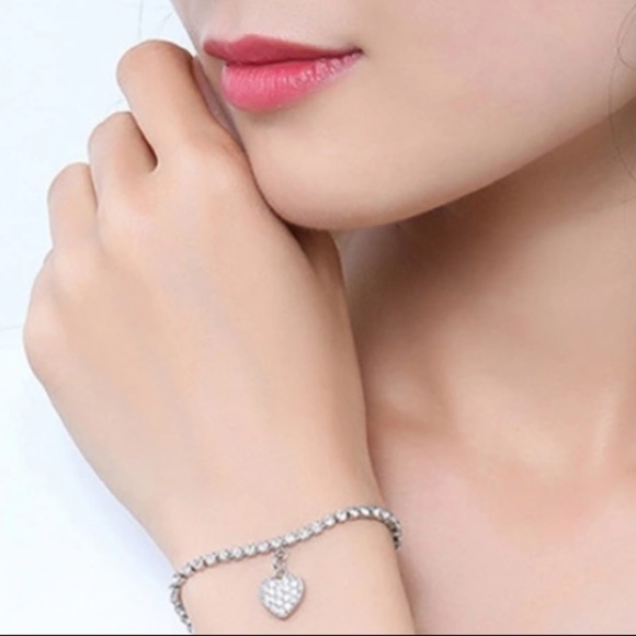 CZ tennis bracelet with heart charm - Picture 2 of 7